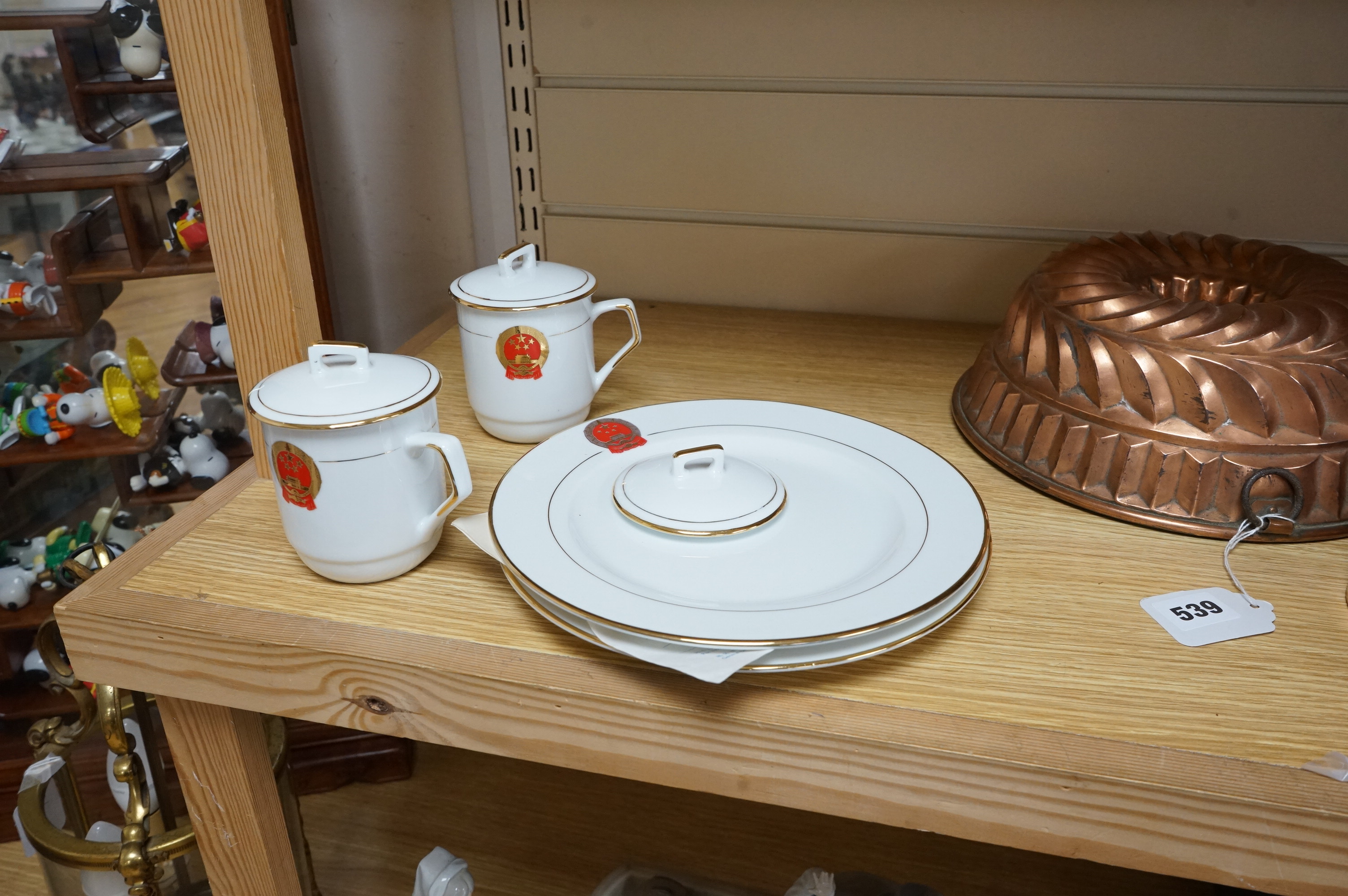 Chinese Communist Party canteen porcelain comprising two cups and two plates, largest 23cm in diameter. Condition - good
